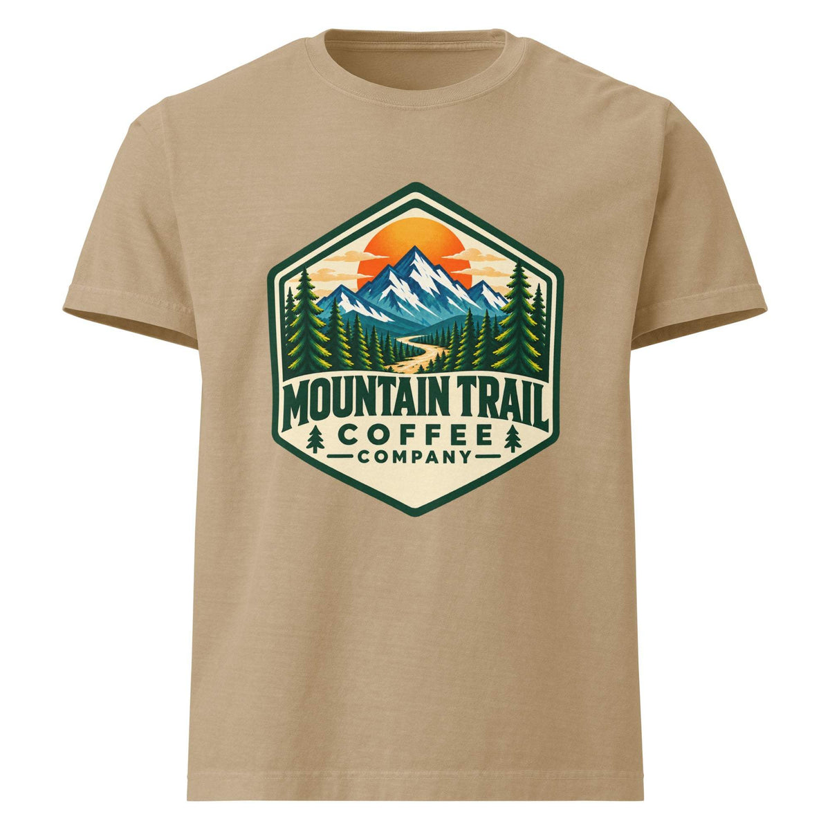 Unisex oversized t-shirt in tan cotton, featuring a bold hexagonal mountain, forest, and sunset graphic with coffee lettering.