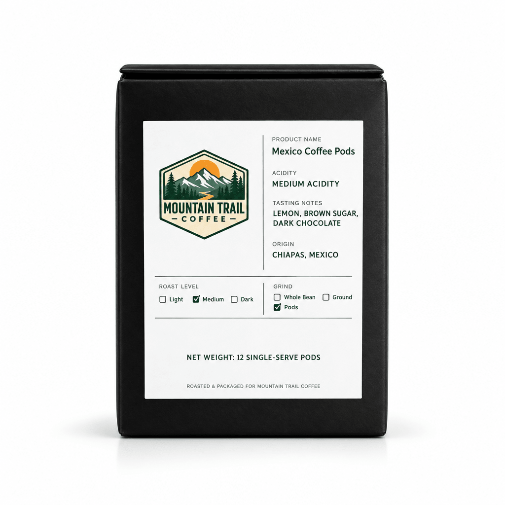 Mexico Coffee Pods in a matte black rectangular box with a white label, mountain logo, and green accents.