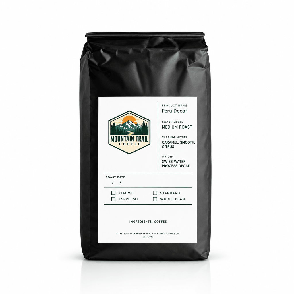 Peru Decaf medium roast coffee in a matte black bag with a white label and Mountain Trail Coffee logo.