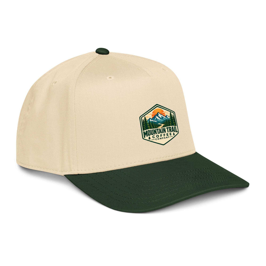 5 panel cap in beige cotton with dark green curved visor, structured front, and mountain trail patch