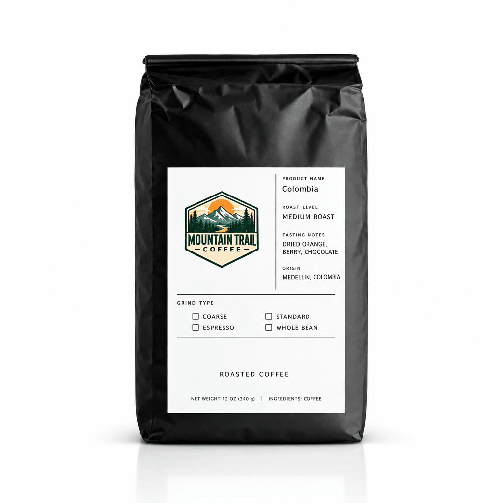 Colombia medium roast coffee in a matte black bag, with a white label featuring a mountain logo and tasting notes.